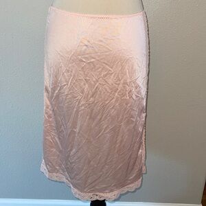 Vintage OLGA peach color slip skirt size small 23.5”
